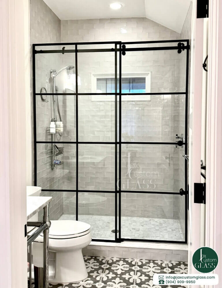 In line single sliding glass doors with metal grids and matte black hardware