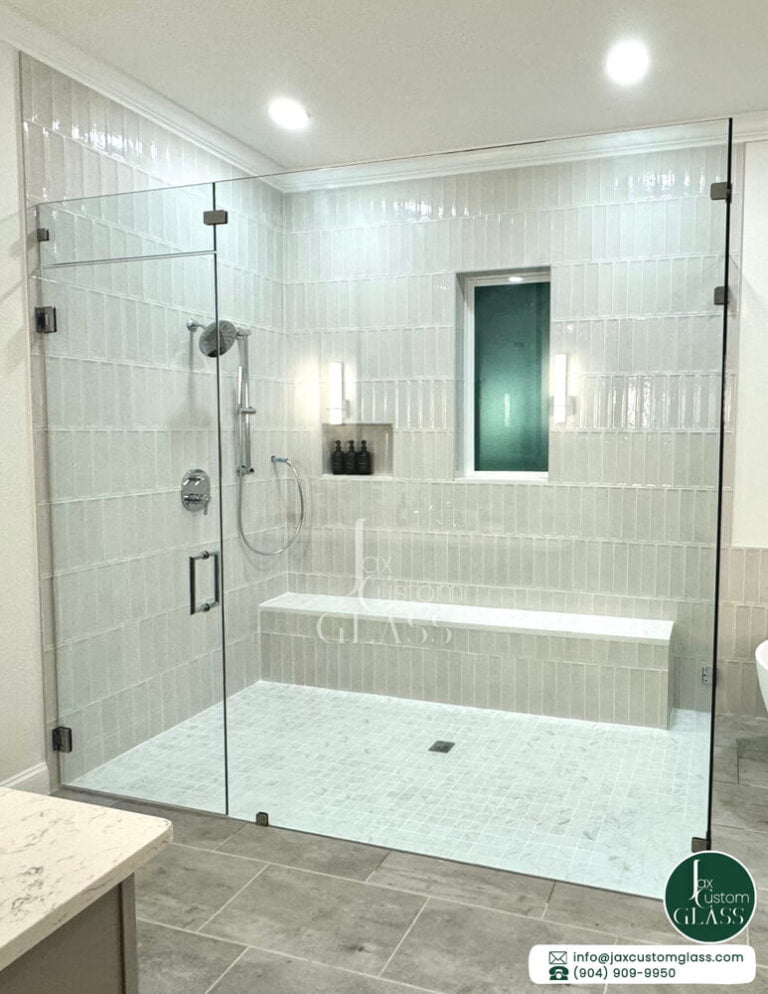 Ninety degree frameless shower enclosure with swing door and chrome hardware 2