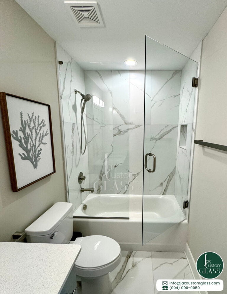 Over the tub frameless shower enclosure with swing door